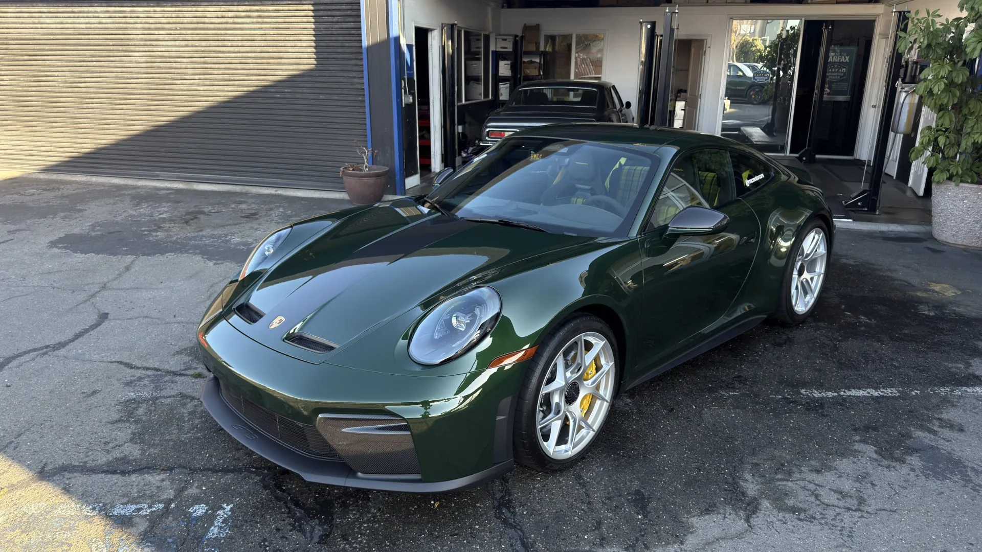 Freshly detailed green Porsche 911 GT3 by GoDetailX